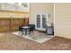 Cozy patio space with a dining table, grill, and easy access to the interior of the home at 2614 Ocracoke St, Charlotte, NC 28208
