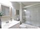 Bathroom with tiled shower and tub at 27092 Village Dr, Fort Mill, SC 29708