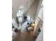 High-angle view of a living room with stone fireplace and vaulted ceiling at 27092 Village Dr, Fort Mill, SC 29708