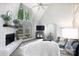 Bright living room featuring a vaulted ceiling, stone fireplace, large windows, and comfortable seating at 27092 Village Dr, Fort Mill, SC 29708