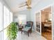 Inviting sunroom with plenty of natural light and a comfortable wicker chair at 27092 Village Dr, Fort Mill, SC 29708