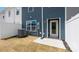 Backyard featuring a door to the house and an air conditioning unit at 3136 Ora Smith Rd, Lincolnton, NC 28092