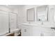Bright bathroom featuring double sinks, a glass-enclosed shower, and modern fixtures at 3136 Ora Smith Rd, Lincolnton, NC 28092