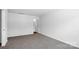 A spacious, carpeted bedroom with a closet and an ensuite bathroom entrance at 3136 Ora Smith Rd, Lincolnton, NC 28092
