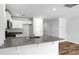 Kitchen featuring a granite countertop, white cabinets, and stainless steel appliances at 3136 Ora Smith Rd, Lincolnton, NC 28092