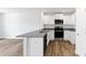 New kitchen features stainless steel appliances, granite countertops and light-colored cabinets at 3136 Ora Smith Rd, Lincolnton, NC 28092