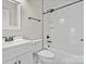 Modern bathroom showcasing a white vanity, subway tile shower, and updated fixtures at 321 E Taylor St, Landis, NC 28088