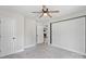 Spacious bedroom featuring plush carpeting, neutral walls, and a modern ceiling fan at 321 E Taylor St, Landis, NC 28088