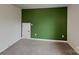 Cozy bedroom with plush carpet and a freshly painted accent wall at 3629 Cerelia Ln, Denver, NC 28037