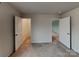 Bedroom with carpet flooring, and two doors, one leading to the closet and another to the hallway at 3629 Cerelia Ln, Denver, NC 28037
