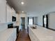 Modern kitchen featuring white cabinets, quartz countertops, and stainless steel appliances at 3629 Cerelia Ln, Denver, NC 28037