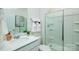 Clean bathroom with a glass-enclosed shower and a single sink vanity, complemented by neutral tones at 3735 Coleman Dr, Charlotte, NC 28215