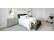 Spacious bedroom featuring a large bed, neutral color scheme, dresser, bedside table and bench at 3735 Coleman Dr, Charlotte, NC 28215