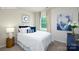 A well decorated bedroom with a large window allowing natural light to illuminate the space at 3735 Coleman Dr, Charlotte, NC 28215