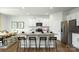 Bright kitchen featuring a large island, granite countertops, stainless appliances and modern finishes at 3735 Coleman Dr, Charlotte, NC 28215