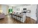 Open-concept kitchen with granite counters, white cabinets and a large island at 3735 Coleman Dr, Charlotte, NC 28215