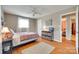 Comfortable bedroom offers wood floors, neutral tones, and a cozy, inviting ambiance at 3903 Graywood Dr, Gastonia, NC 28052