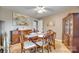 Traditional dining room with hardwood floors, chandelier, wood furniture, and natural light at 3903 Graywood Dr, Gastonia, NC 28052