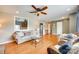 Living room with hardwood floors, view to kitchen, and comfortable seating area at 3903 Graywood Dr, Gastonia, NC 28052