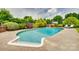 A pristine swimming pool surrounded by lush greenery and a well-maintained pool deck at 3903 Graywood Dr, Gastonia, NC 28052