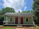 Quaint home with two front doors and a covered porch at 424 Congress S St, York, SC 29745