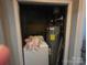 Storage area with a washer and water heater at 424 Congress S St, York, SC 29745
