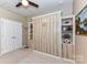 Bedroom featuring a Murphy bed with built-in shelving offering space-saving design and functionality at 5064 Lassen Volcanic Trl, Lancaster, SC 29720