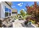 Charming home featuring a beautiful stone porch and vibrant landscaping at 5064 Lassen Volcanic Trl, Lancaster, SC 29720