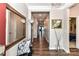 Long hallway features hardwood floors, recessed lighting, and access to various rooms at 5064 Lassen Volcanic Trl, Lancaster, SC 29720