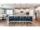 Spacious kitchen featuring a large island, modern appliances, and ample counter space, perfect for entertaining at 5064 Lassen Volcanic Trl, Lancaster, SC 29720