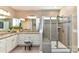 Bright and spacious main bathroom with double vanity and glass shower at 5064 Lassen Volcanic Trl, Lancaster, SC 29720