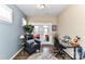 Bright office space with glass desk, black office chair, and natural light at 5064 Lassen Volcanic Trl, Lancaster, SC 29720