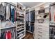 Organized walk-in closet featuring built-in shelving and hanging racks at 5064 Lassen Volcanic Trl, Lancaster, SC 29720