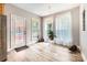 Bright breakfast nook with a door to the back porch and large windows bringing in ample natural light at 5832 Lagrande Dr, Charlotte, NC 28269
