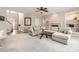 Spacious living room with a cozy fireplace, neutral decor, and an open layout, perfect for entertaining at 5832 Lagrande Dr, Charlotte, NC 28269