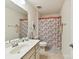 Bathroom featuring a shower with a themed shower curtain and vanity at 8035 Pastime Ln, Clover, SC 29710
