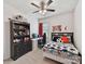 Cozy bedroom featuring a soccer-themed bed set, desk, and ceiling fan at 8035 Pastime Ln, Clover, SC 29710