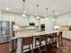 Gourmet kitchen featuring an oversized island, stainless steel appliances, and ample storage at 8035 Pastime Ln, Clover, SC 29710