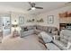 Comfortable living room with a large sectional sofa and ceiling fan at 8035 Pastime Ln, Clover, SC 29710