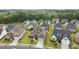 Beautiful aerial view of a residential area with lovely homes and landscaped yards at 82120 Standing Oak Dr, Charlotte, NC 28278