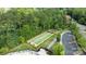 Aerial view of bocce ball courts, showcasing the lush greenery and manicured landscape at 82120 Standing Oak Dr, Charlotte, NC 28278