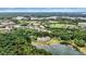 Breathtaking aerial view of the community nestled amidst lush greenery and scenic lake views at 860 Jetton St # 59, Davidson, NC 28036