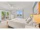 Bright bedroom with beautiful lake view, outdoor seating, and a king size bed at 860 Jetton St # 59, Davidson, NC 28036