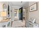 Inviting entryway with an open door leading to a lake view and charming interior details at 860 Jetton St # 59, Davidson, NC 28036