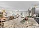 Well-appointed kitchen with granite counters flowing into an open living space with water views at 860 Jetton St # 59, Davidson, NC 28036