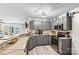 Modern kitchen with granite countertops, stainless steel appliances, and scenic lake views at 860 Jetton St # 59, Davidson, NC 28036