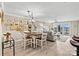 Open-concept living and dining area with modern furnishings and abundant natural light at 860 Jetton St # 59, Davidson, NC 28036