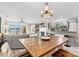 Open living space with a fireplace and views, seamlessly connecting to the kitchen at 860 Jetton St # 59, Davidson, NC 28036