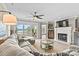 Comfortable living room with sliding glass doors to a patio, a fireplace, and stylish decor at 860 Jetton St # 59, Davidson, NC 28036