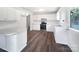 Bright kitchen with modern stainless steel appliances, white cabinets and countertop space at 908 Mccollough St, Statesville, NC 28677